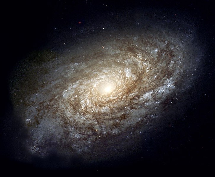 En 1995, la majestuosa galaxia espiral NGC 4414 fue fotografiada por el Telescopio Espacial Hubble como parte del Proyecto Clave HST sobre la Escala de Distancia Extragalctica.