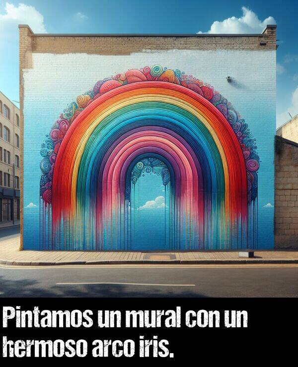 mural: Pintamos un mural con un hermoso arco iris.