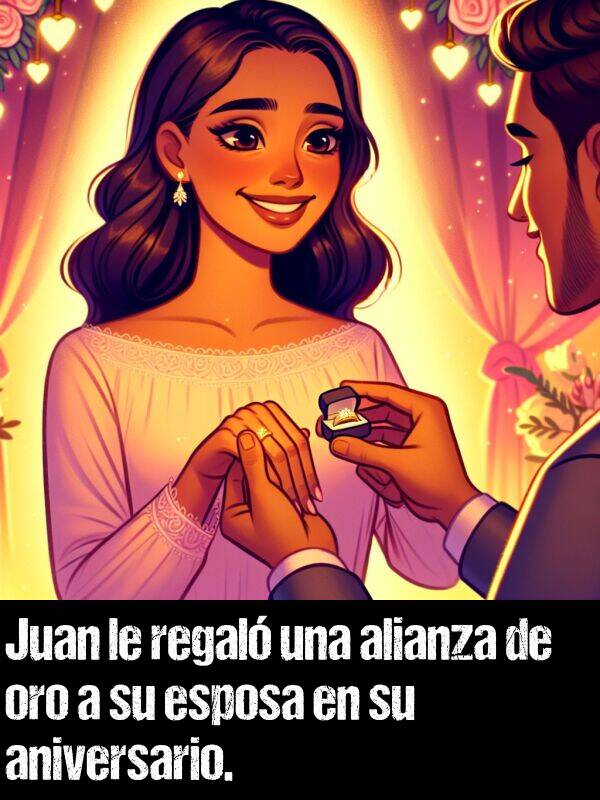 aniversario: Juan le regal una alianza de oro a su esposa en su aniversario.