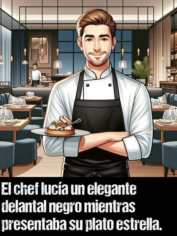 luca: El chef luca un elegante delantal negro mientras presentaba su plato estrella.