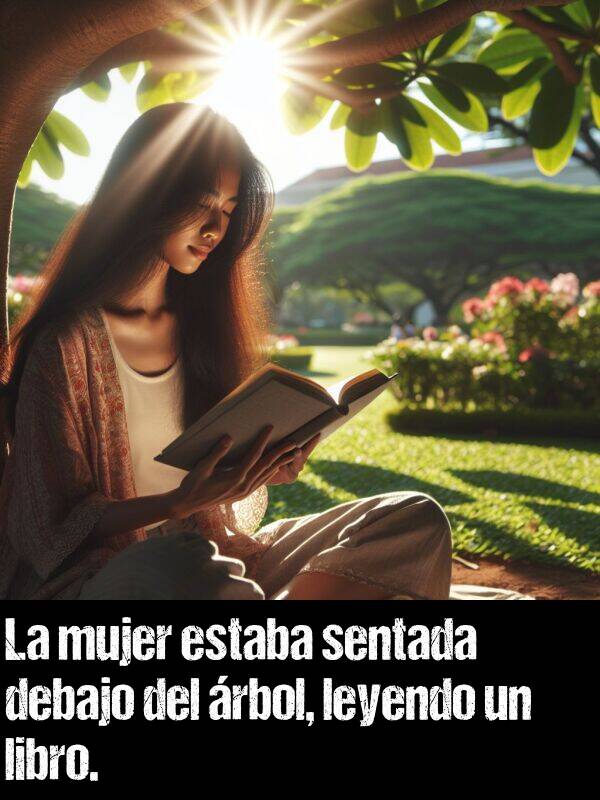 rbol: La mujer estaba sentada debajo del rbol, leyendo un libro.